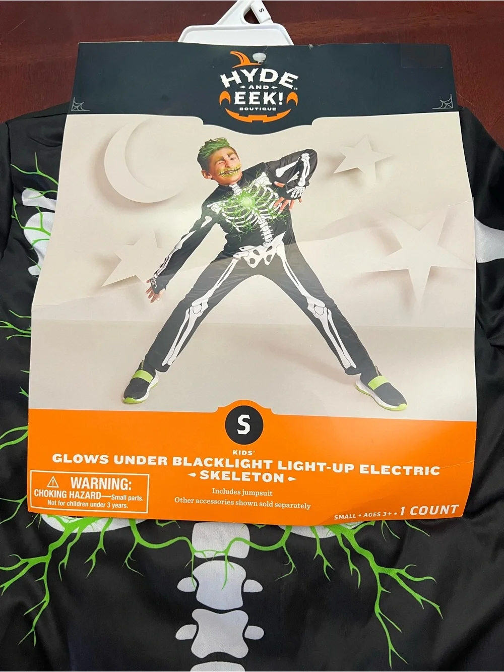 Hyde & EEK! Kids Black Light-Up Skeleton Costume with Glowing Chest (S 6-7)